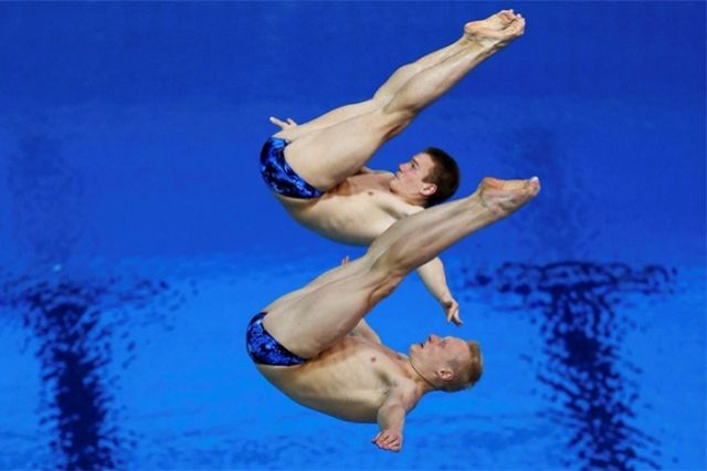 Илья Захаров и Евгений Кузнецов стали бронзовыми призерами в синхронных прыжках с трехметрового трамплина.