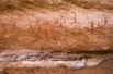 Наскальная живопись в горах Тадрарт-Акакус в Ливии. Древние рисунки датируются 12000 г. до н. э. — 100 г. н. э. В начале ХХI века в этом районе началась разведка нефти, что поставило под угрозу памятники наскального искусства. Подземные взрывы, используемые для локализации залежей нефти, уже значительно повредили ряд скал, в том числе и тех, на которых имеются изображения.