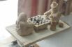 Маленькие тувинские шахматы. Вместо короля, ферзя, слонов и пешек - бараны и верблюды.