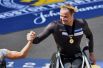 Марсель Хуг из Швейцарии стал победителем среди мужчин в специальном забеге для инвалидов.