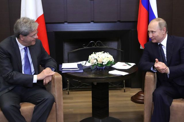Владимир Путин и председатель Совета министров Италии Паоло Джентилони.
