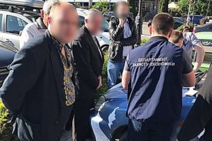 Фото чиновника при задержании