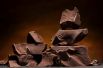 Шоколад. Горький шоколад с содержанием какао 70 % - 550 ккал.