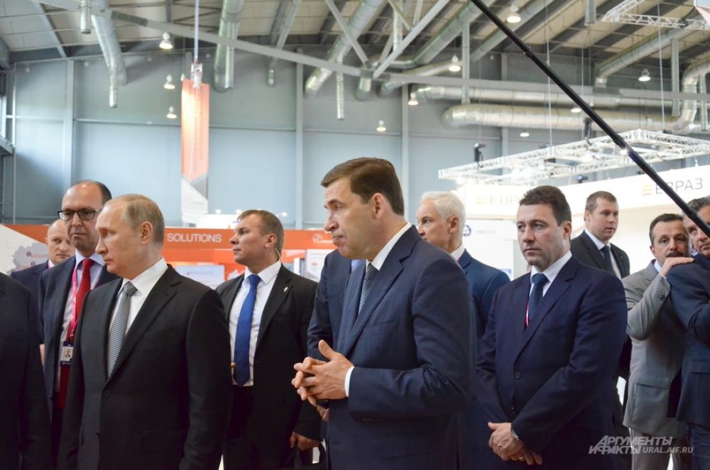 Владимир Путин, Евгений Куйвашев и Игорь Холманских.