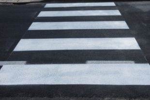 Работы по укладке асфальта в Омске продолжаются.