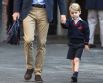 7 сентября. Британский принц Уильям сопровождает своего сына принца Джорджа в первый день учебы в школе Томаса в Баттерси, Лондон.