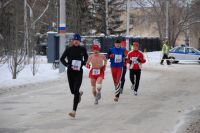 21, 1 км бегут в Рождественский полумарафон в Омске.