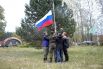 Честь поднять флаг России выпала капитанам команд.