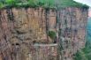 Туннель Гуолян в Китае длиной в 1,2 километра вырублен прямо внутри горы Тайхань. Он назван  по имени деревни, жители которой в 1972 году своими руками построили для себя дорогу.