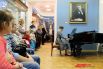 В Доме Мешкова любители живой музыки собрались, чтобы послушать концерт «Музыка в эпоху революции». 