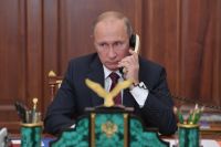 Президент РФ Владимир Путин во время телефонного разговора с главой ДНР Александром Захарченко и главой ЛНР Игорем Плотницким.