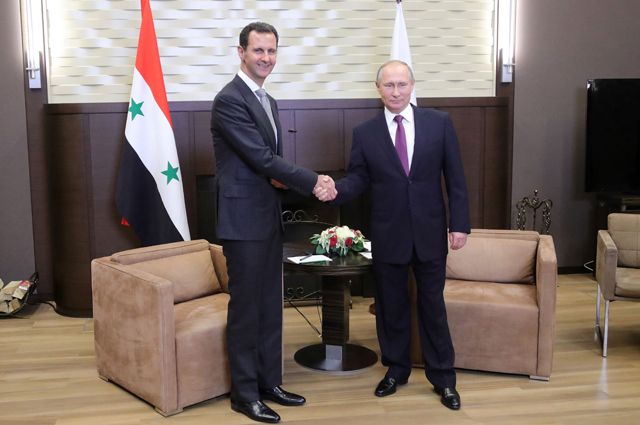 Президент РФ Владимир Путин и президент Сирии Башар Асад во время встречи.