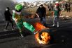 Столкновения палестинцев с израильскими войсками недалеко от еврейского поселения Бейт-Эль к северу от Иерусалима.