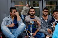 Беженцы с Ближнего Востока в Гамбурге.