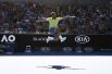 Французский теннисист Жо-Вильфрид Тсонга из Франции отмечает победу в матче против Дениса Шаповалова из Канады. 