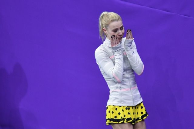 Евгения Тарасова (Россия) после окончания выступления в произвольной программе парного катания на соревнованиях по фигурному катанию на XXIII зимних Олимпийских играх