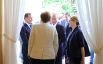 Владимир Путин, Дмитрий Медведев и Ангела Меркель во время встречи в Сочи.