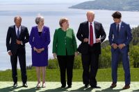 Председатель Европейского совета Дональд Туск,  премьер-министр Великобритании Тереза Мей, канцлер Германии Ангела Меркель, президент США Дональд Трамп и премьер-министр Канады Джастин Трюдо на саммите G7. 