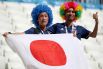 На стадион многие японцы пришли с флагами своей страны. 