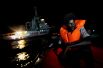 Мигрант на борту спасательного судна в Средиземном море.
