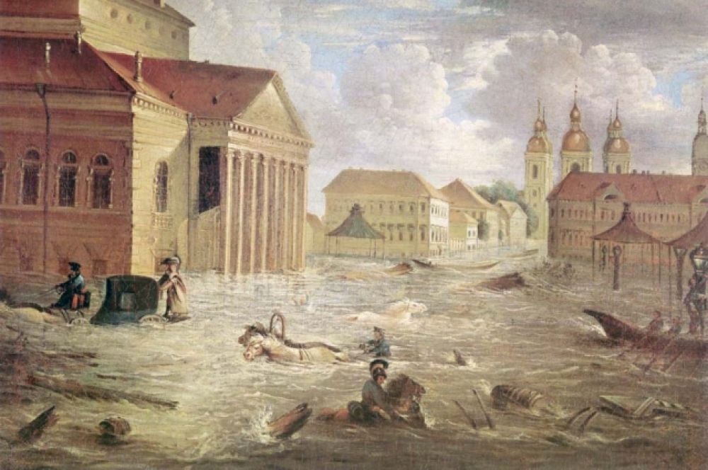 7 (19) ноября 1824 вода в Неве поднялась выше ординара на 421 см. Александр Пушкин описал напор стихии в своей поэме «Медный всадник»: «Погода пуще свирепела/ Нева вздувалась и ревела/ Котлом клокоча и клубясь/ И вдруг, как зверь остервеняясь/ На город кинулась…» Последствия наводнения были чудовищные: несколько сотен людей и тысячи голов домашнего скота погибли, были разрушены дома, затоплены оказались селения вокруг Екатерингофа и казенный чугунный завод.