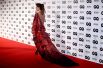 Актриса Кейт Бекинсейл на ковровой дорожке премии GQ «Человек года» в галерее Tate Modern в Лондоне, Великобритания.