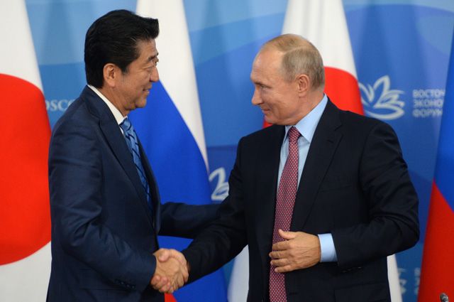 Премьер-министр Японии Синдзо Абэ и Владимир Путин.