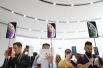 Стенды с новинками Apple на презентации в Купертино.