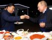 Президент России Владимир Путин и президент Китая Си Цзиньпин во время посещения выставки «Улица Дальнего Востока» в рамках Восточного экономического форума, Владивосток, Россия.