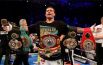 На кону в этом бою стояли чемпионские пояса по версиям WBC, WBA, WBO, IBF, а также титул журнала The Ring.