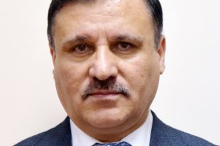 Шерали Валиев.