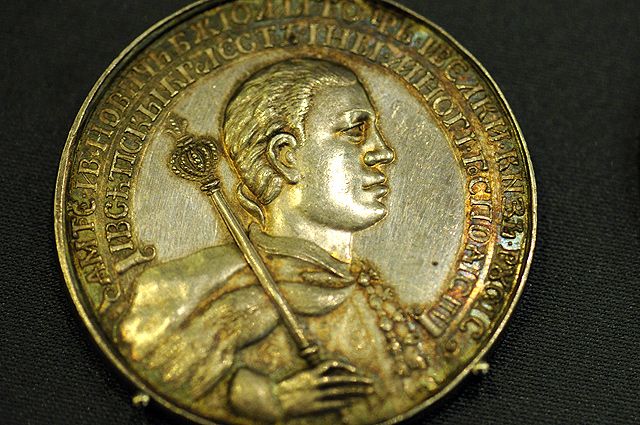 Монета 1606 г. с портретом Лжедмитрия I.
