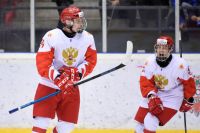 Игроки юниорской сборной России по хоккею по время матча против шведов.