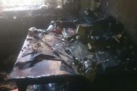 В Новотроицке пожарные спасли из горящего дома двух женщин и мальчика