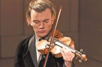 Житель Обручевского района скрипач Юрий Ревич – всемирно признанная звезда в мире классической музыки.
