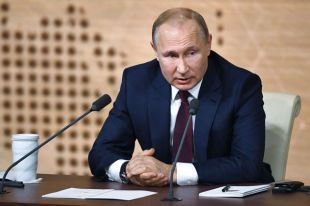 Президент РФ Владимир Путин на большой ежегодной пресс-конференции.