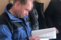 В Киевской области полицейского подозревают в вымогательстве