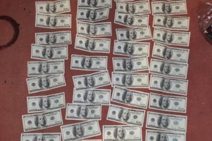 В Винницкой области полицейский требовал 5,5 тысяч долларов взятки