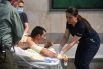 Специалисты оказывают медицинскую помощь мирному жителю, пострадавшему во время столкновений в Нагорном Карабахе. Снимок опубликован Министерством иностранных дел Армении.