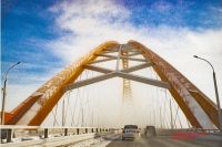 По словам гостя, ездить по Бугринскому мосту невозможно из-за плохого состояния дороги. 