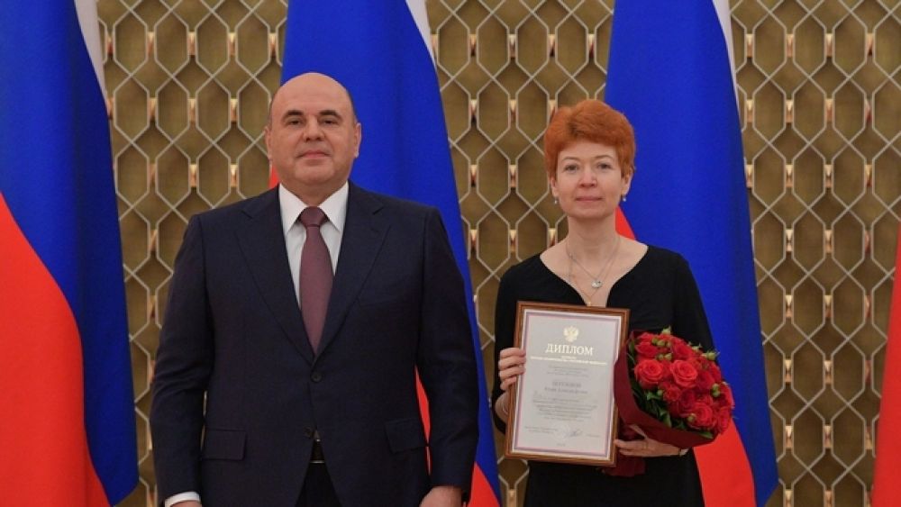 Михаил Мишустин с редактором «АиФ» Юлией Шигаревой.