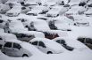 Занесенные снегом машины в Краснодаре.