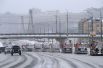 Работа снегоуборочной техники на Зубовском бульваре в Москве.