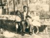 Соколовский Василий Данилович с внучками Наташей, Олей и Леной в саду на даче в п. Трудовая Северная, 1953 г.