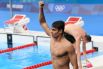 Евгений Рылов, занявший 1-е место в финальном заплыве на 100 метров на спине среди мужчин на XXXII летних Олимпийских играх