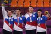 Станислав Шаров, Александр Зуев, Илья Карпенков и Кирилл Писклов (слева направо), завоевавшие серебряные медали в соревнованиях по баскетболу 3х3 среди мужчин на XXXII летних Олимпийских играх в Токио