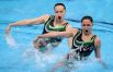 Серебро взяли китайские спортсменки Хуан Сюэчэнь и Сунь Вэньянь (192,4499 балла)