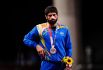 Кумар Рави (Индия), завоевавший серебряную медаль в соревнованиях по вольной борьбе среди мужчин в весовой категории до 57 кг на XXXII Олимпийских играх в Токио