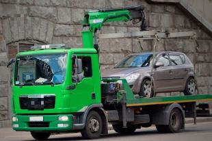 Нескольких сотрудников КГГА подозревают в схеме с эвакуацией автомобилей