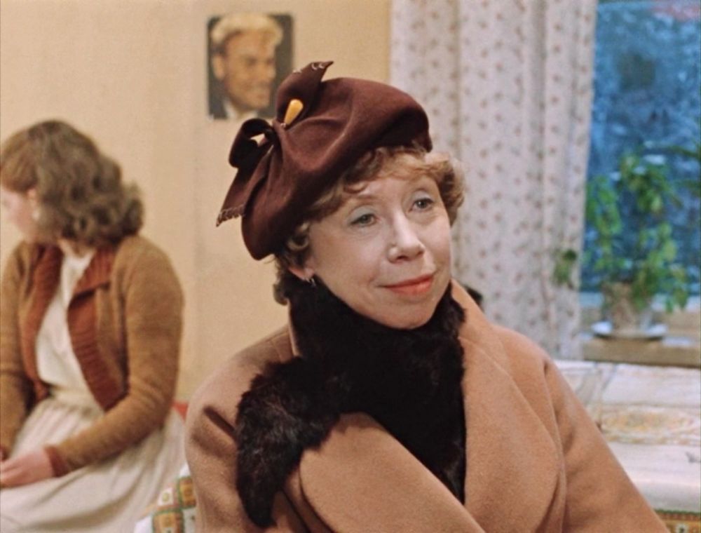 Мать Рудольфа Рачкова — «Москва слезам не верит» (1979). Властная, эксцентричная, привыкшая всё в жизни брать в свои руки, мать телеоператора Рудольфа (или Родиона). Вырастив беспечного, безответственного, ведомого сына, она уверена, что вправе принимать за него все решения. Мастерски подстраиваясь под обстоятельства, она пытается отвоевать Рудику «место под солнцем». Сначала она обходительна и интеллигентна, но стоит ей узнать, что всё пошло не по намеченному ей плану, и перед нами — жёсткая, расчетливая особа, которая ни перед чем не остановится